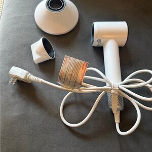 Compact White Hair Dryer with Attachments